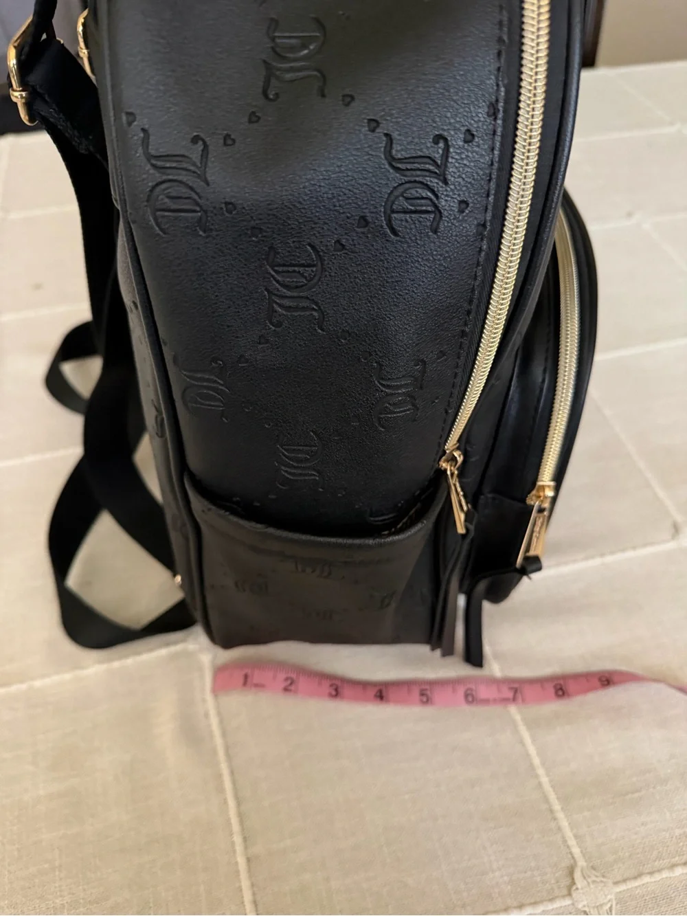 Juicy Couture Black Embossed Logo Backpack with Gold Hardware
